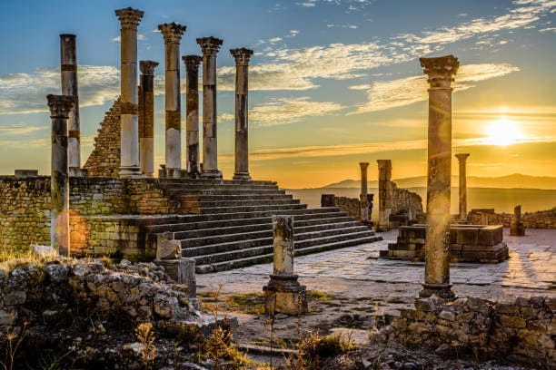 Volubilis is a partly excavated Berber city in Morocco situated near the city of Meknes, and commonly considered as the ancient capital of the kingdom of Mauretania.