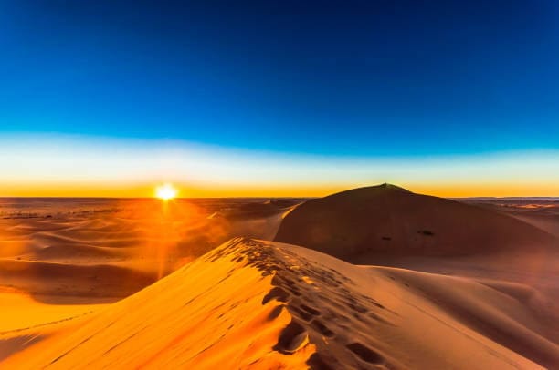 View on sunrise in the Sahara desert Erg chegaga M'hamid in Morocco